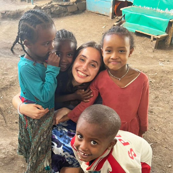 Sylvie, from london, making some new friends in ethiopia