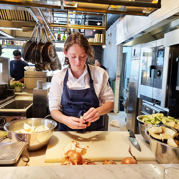 Maya works in the kitchen at north abraxas