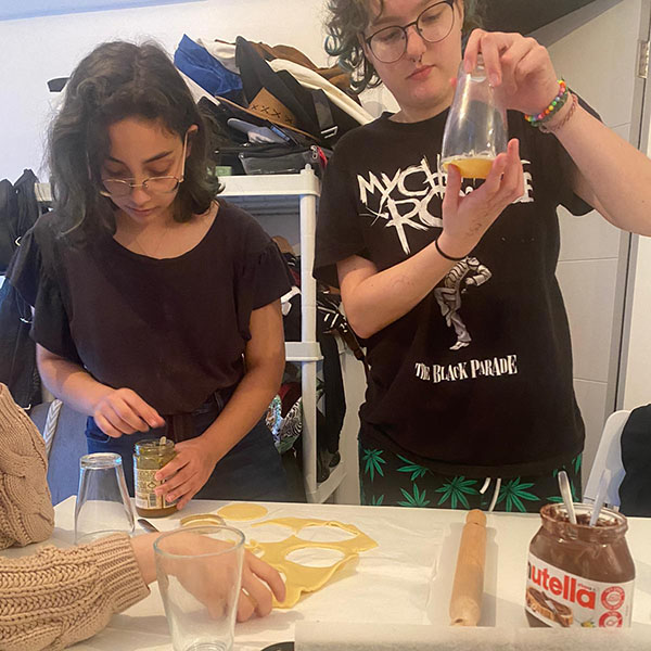 Nechama and libby seem very focused on their hamentashen!